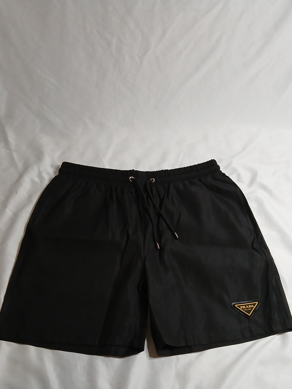 Prada Black Swim Shorts With Gold Logo Patch
